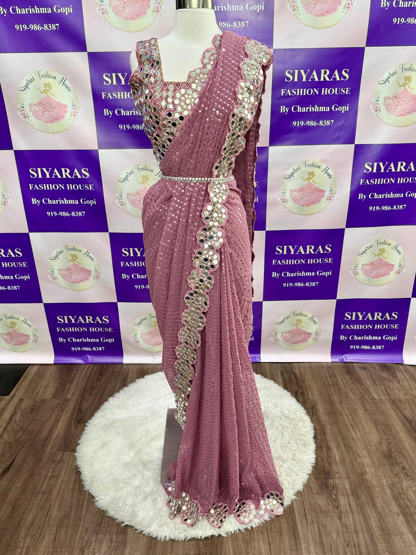 Beautiful sequence party wear saree with real mirror work border in Georgette fabric. Size available is 36/38 upto 42