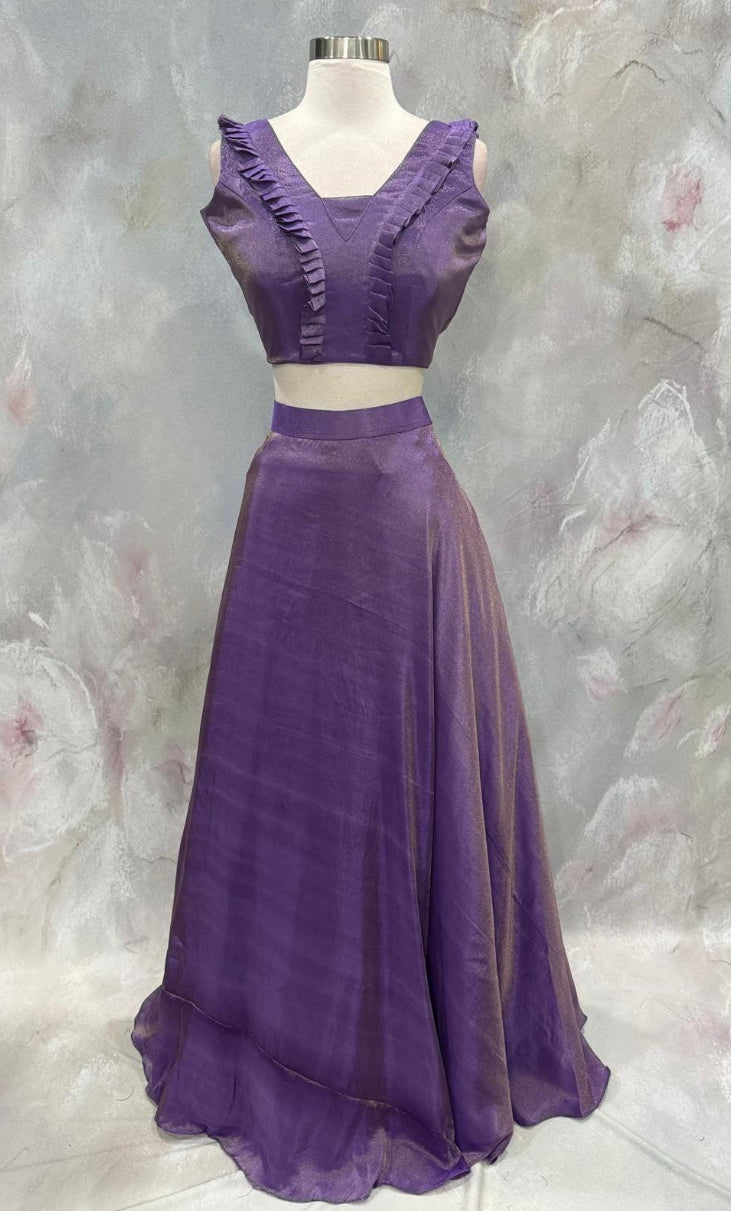 Custom elegance by Siyaras Fashion House. Available in Size 36-38. This customized tissue crop top lehenga set from Siyaras Fashion House