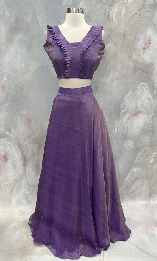 Custom elegance by Siyaras Fashion House. Available in Size 36-38. This customized tissue crop top lehenga set from Siyaras Fashion House