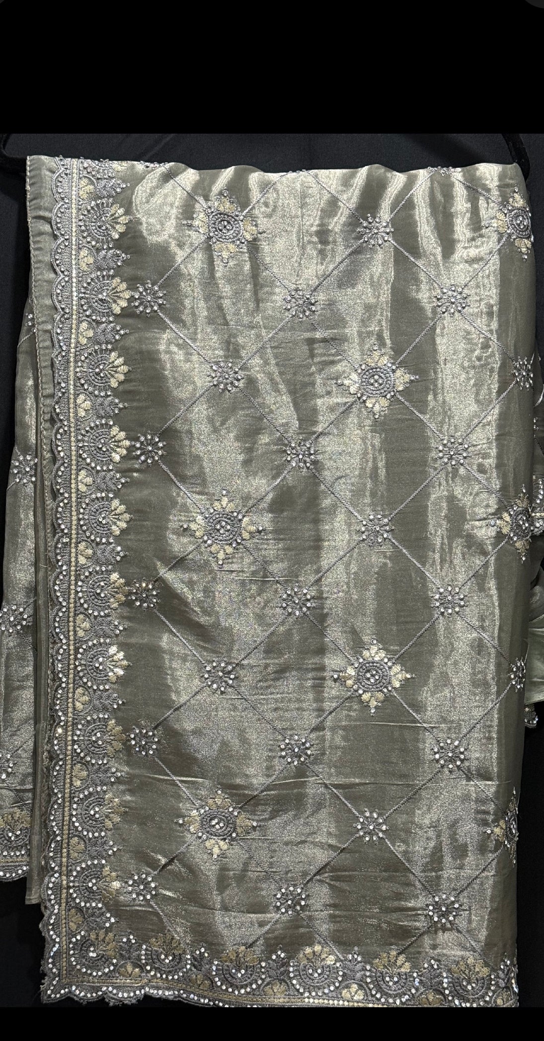 Premium Partywear organza saree. A subtle sparkle of Swarovski & elegant embroidery for a truly timeless look. 
 Comes with matching satin inner skirt , Blouse fits 38-42.