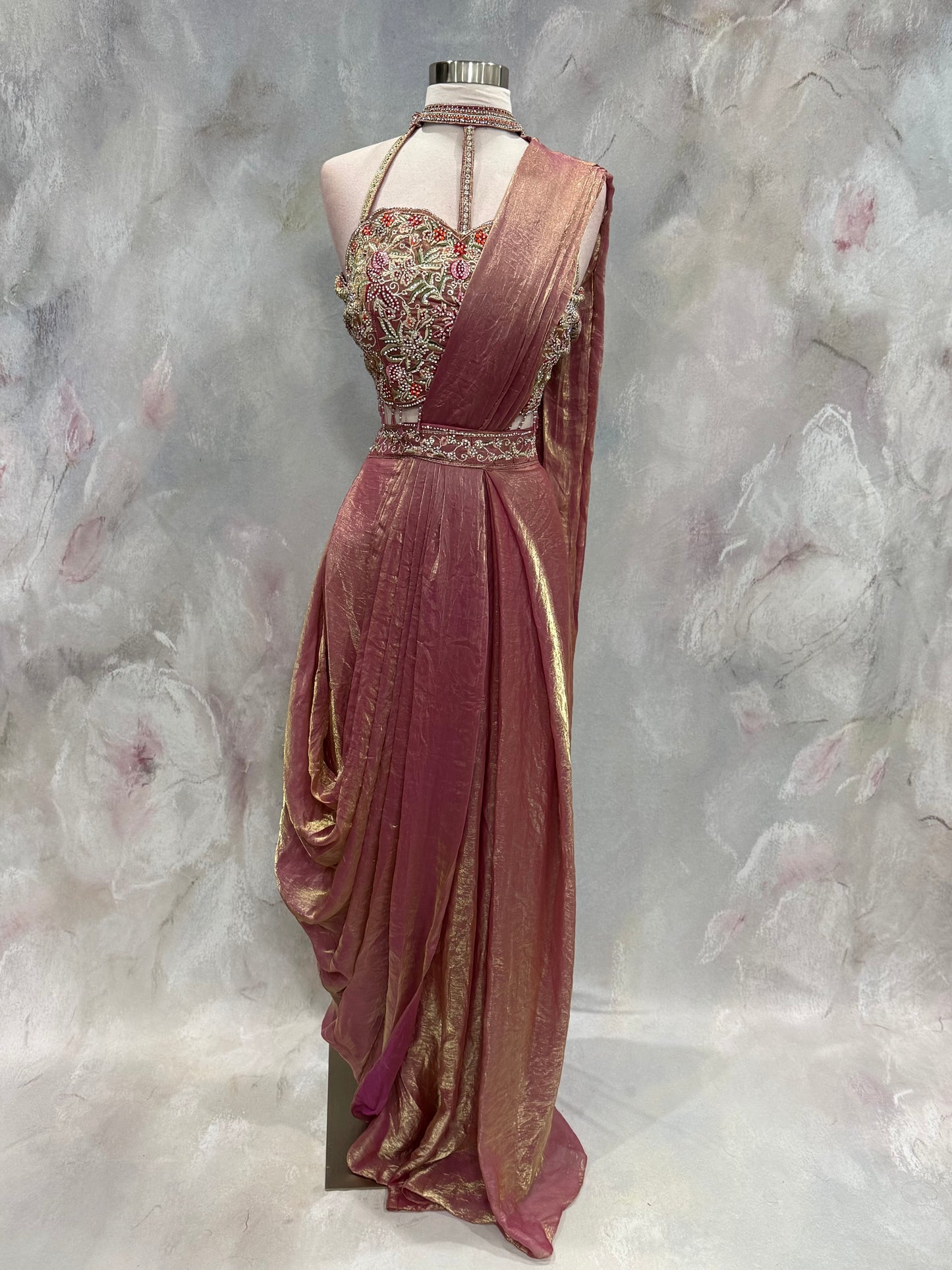 Stunning blush pink Indo-Western drape outfit featuring a beautifully embroidered tube-style blouse adorned with intricate stone, sequin, and zari work