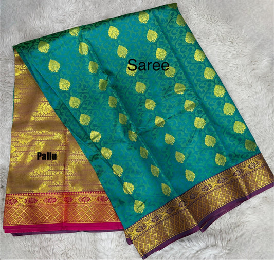 Beautiful Pattu saree in green and gold combo. Blouse piece attached inside. Perfect  gifting saree