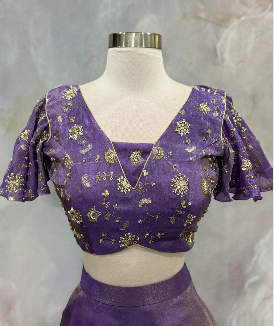 Custom elegance by Siyaras Fashion House. Size 36-38. This customized tissue crop top lehenga set from Siyaras Fashion House features a rich