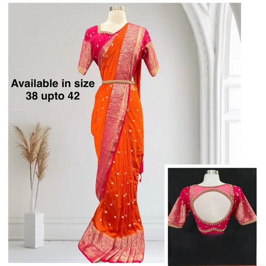 Stunning orange and pink combo Raw Mango silk saree paired with a contrasting pink blouse and Hand work on the blouse. Available in size 38 upto 42. Can be altered to your size.