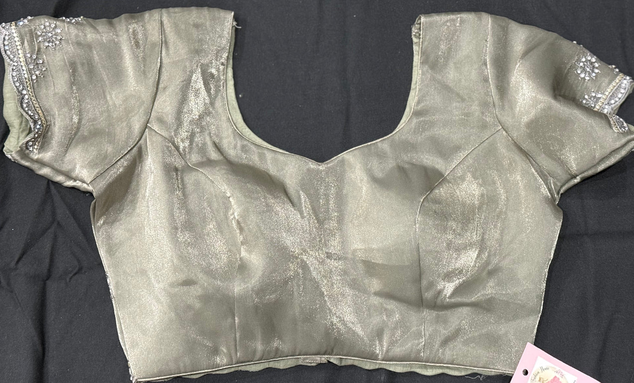 Premium Partywear organza saree. A subtle sparkle of Swarovski & elegant embroidery for a truly timeless look. 
 Comes with matching satin inner skirt , Blouse fits 38-42.