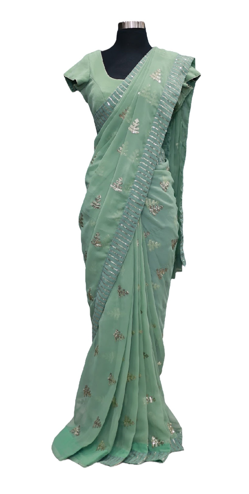 Beautiful georgette saree with sequin all over comes with stitched blouse. Available in size 36