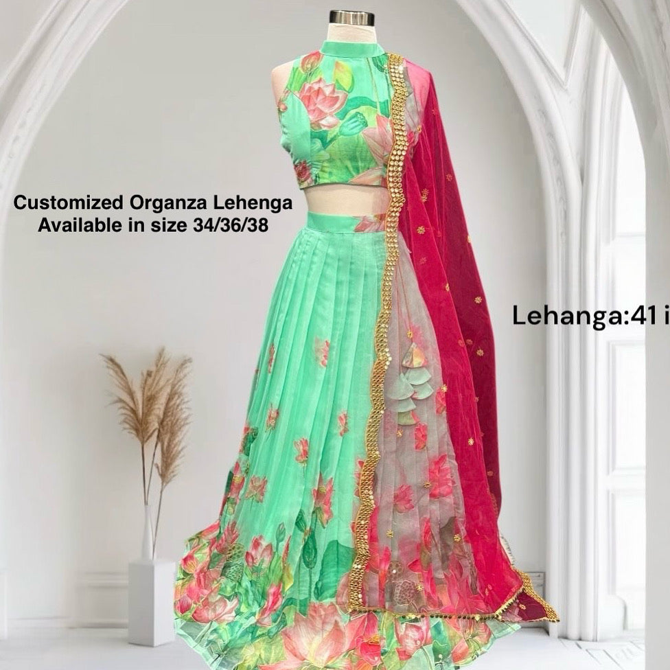 Customized Organza Lehenga / Half Saree in Green  and pink combo. Available in size 34/36/38.