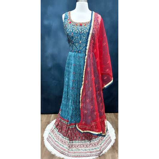 Beautiful Bandini party wear long gown with mirror and thread work on it. Available in size 44 inch