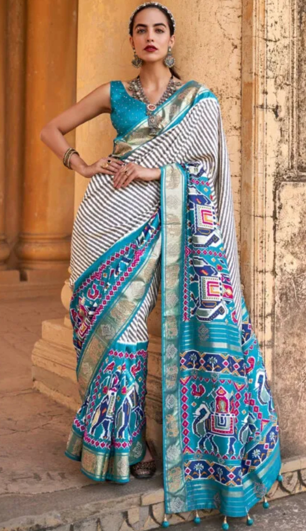 Lehariya Patola silk saree in Spanish blue color with stitched Blouse size fits 38 to 40