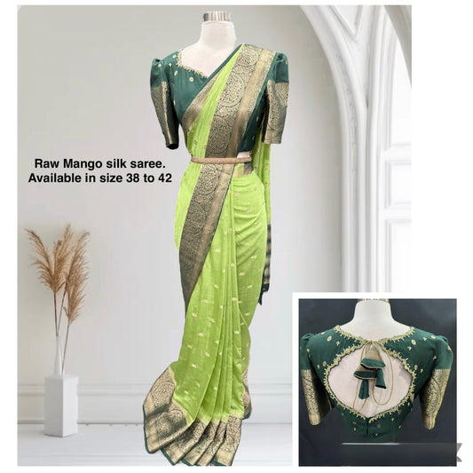 Stunning Green combo Raw Mango silk saree paired with a contrasting pink blouse and Hand work on the blouse. Size 38 upto 42.