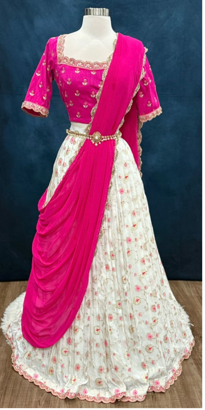 Pretty in pink & blooming in style.
Raw silk blouse paired with a charming Banarasi silk dyeable floral lehanga… elegance redefined
Size 36/38