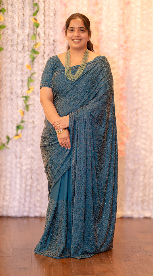Beautiful heavy party wear saree with sarowski work in it. Fits size 40 to 42