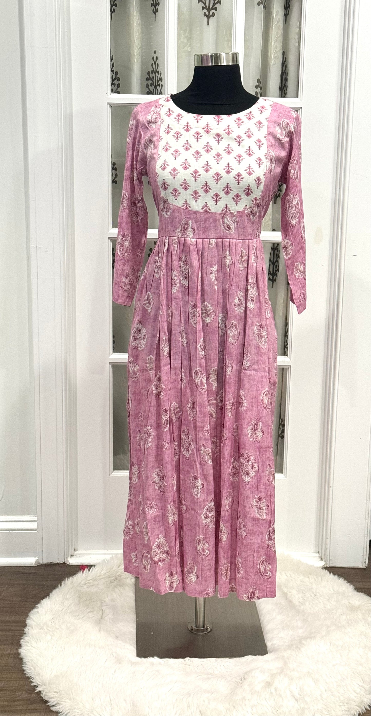 Casual wear long gown in rayon fabric. Size 38

gown length is 46