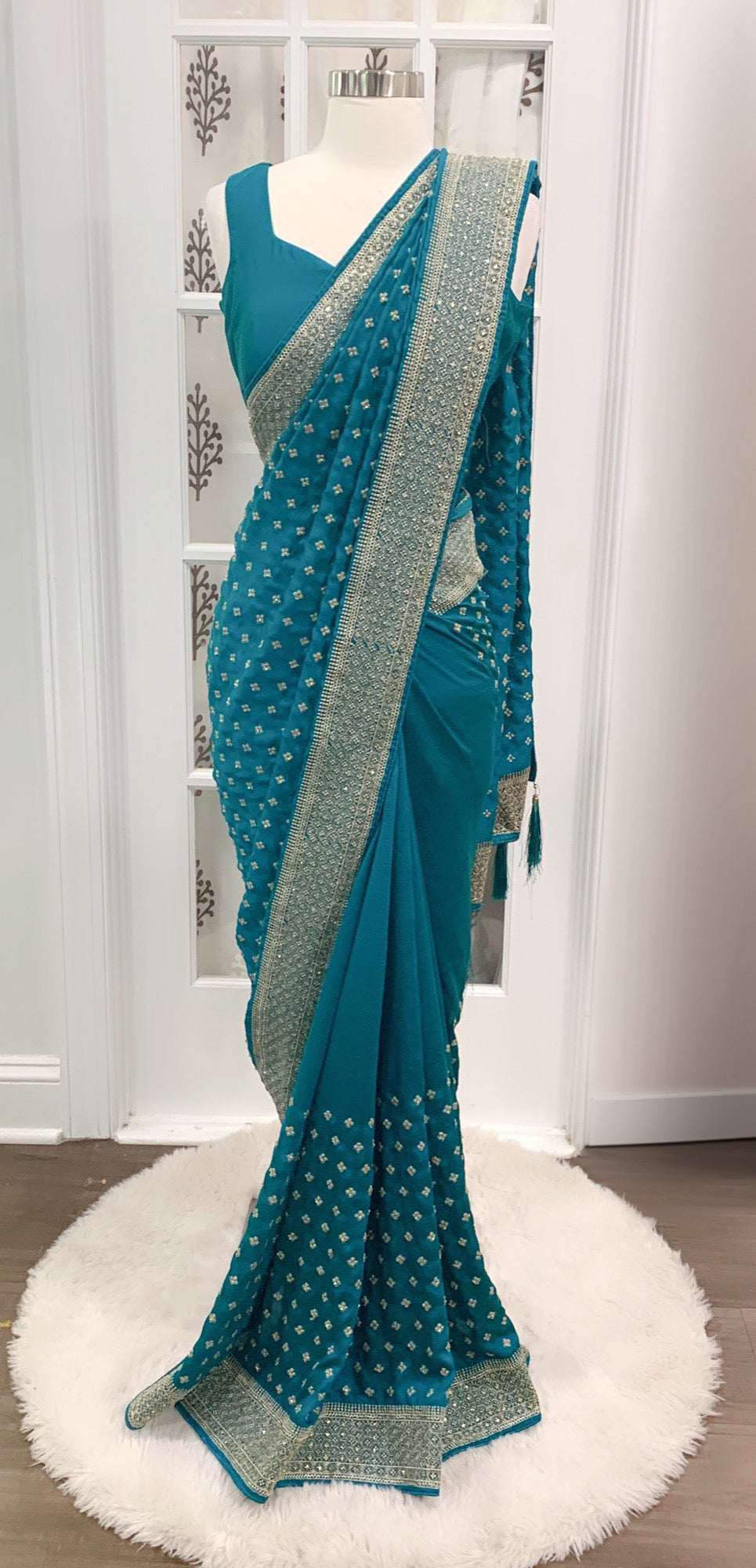 Beautiful cocktail Partywear teal blue Saree with stitched sleeveless blouse size 38