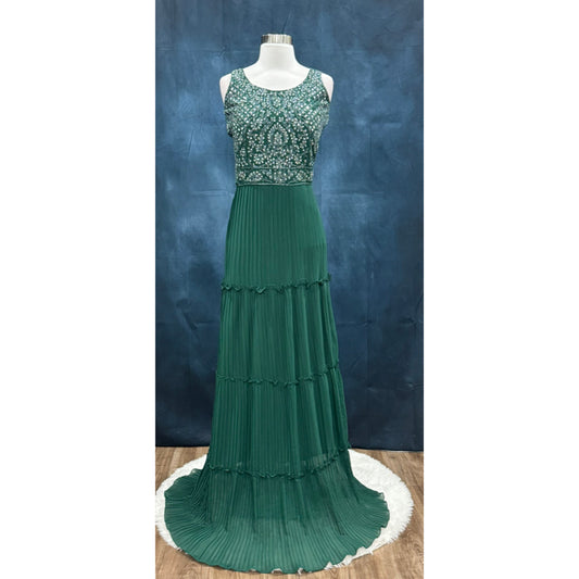 Beautiful party wear in dark green color. Available in size 38 to 40. Length of the gown is 64 inch