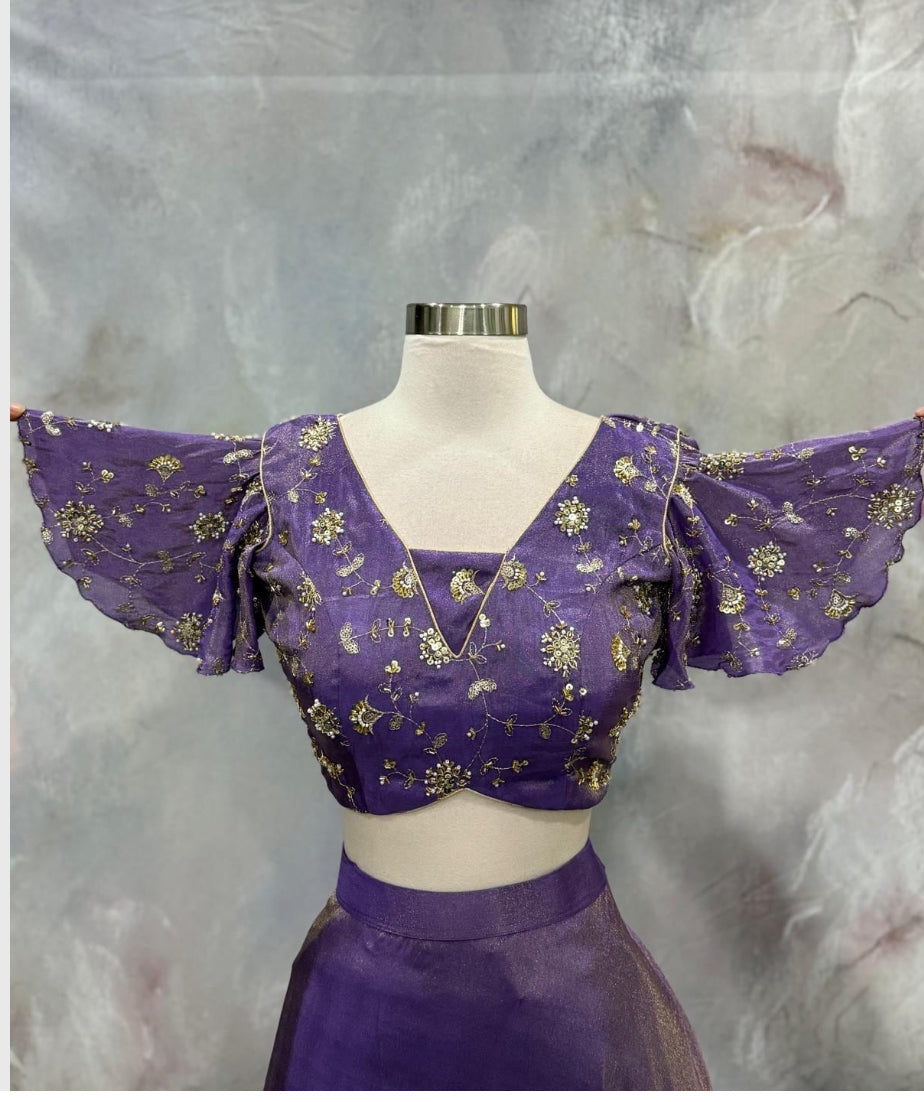 Custom elegance by Siyaras Fashion House. Size 36-38. This customized tissue crop top lehenga set from Siyaras Fashion House features a rich
