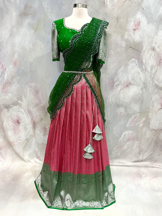Beautiful Customized Banarasi silk half sarees in Green and bubble gum pink hues Maggam work blouses and bead embellishments size 34 to 36