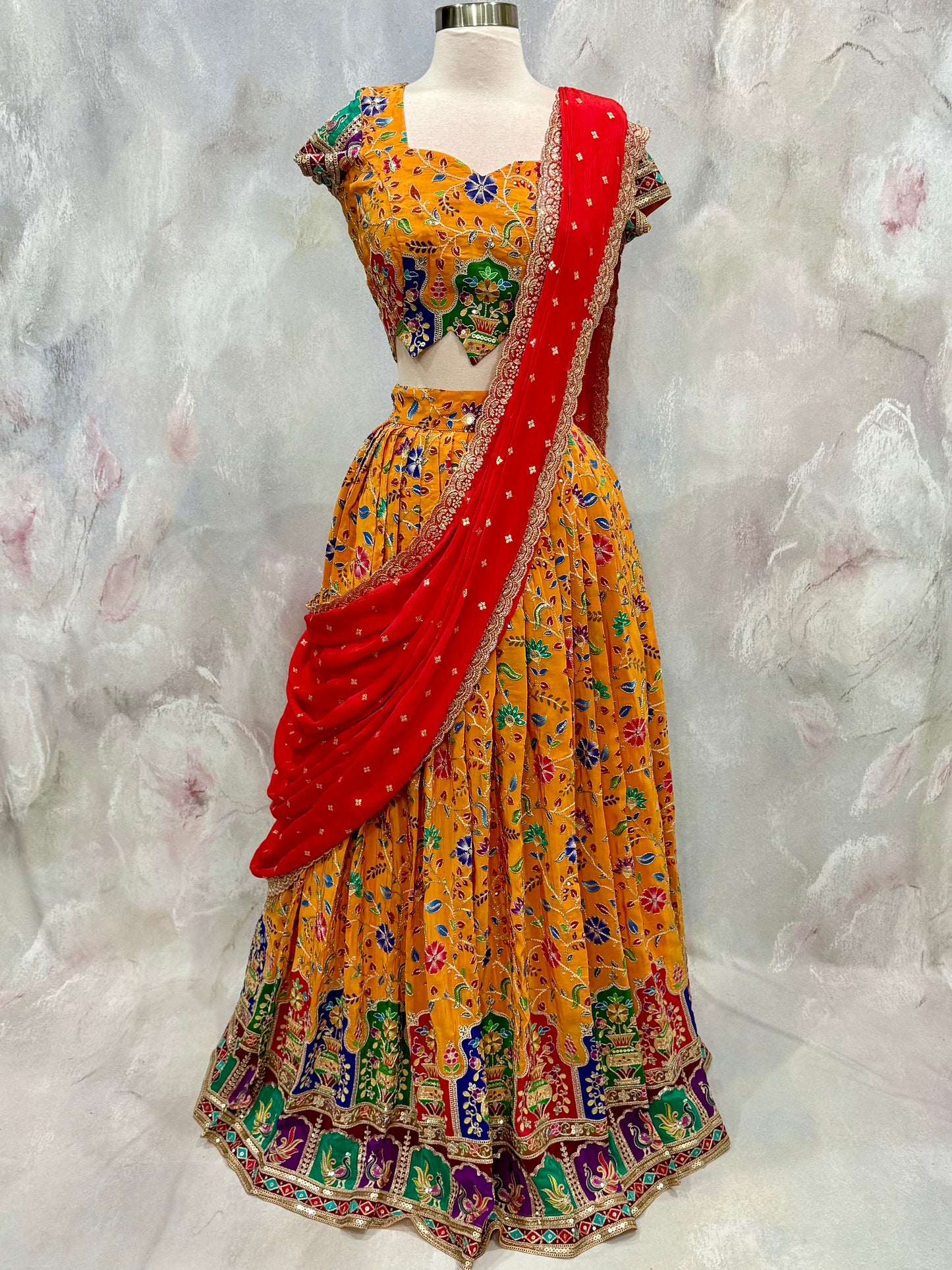 Beautiful Customized Position Print Designer Lehenga. Perfect for weddings, festive.                      Available in chest size 40 to 46.       Skirt waist 32 to 34.