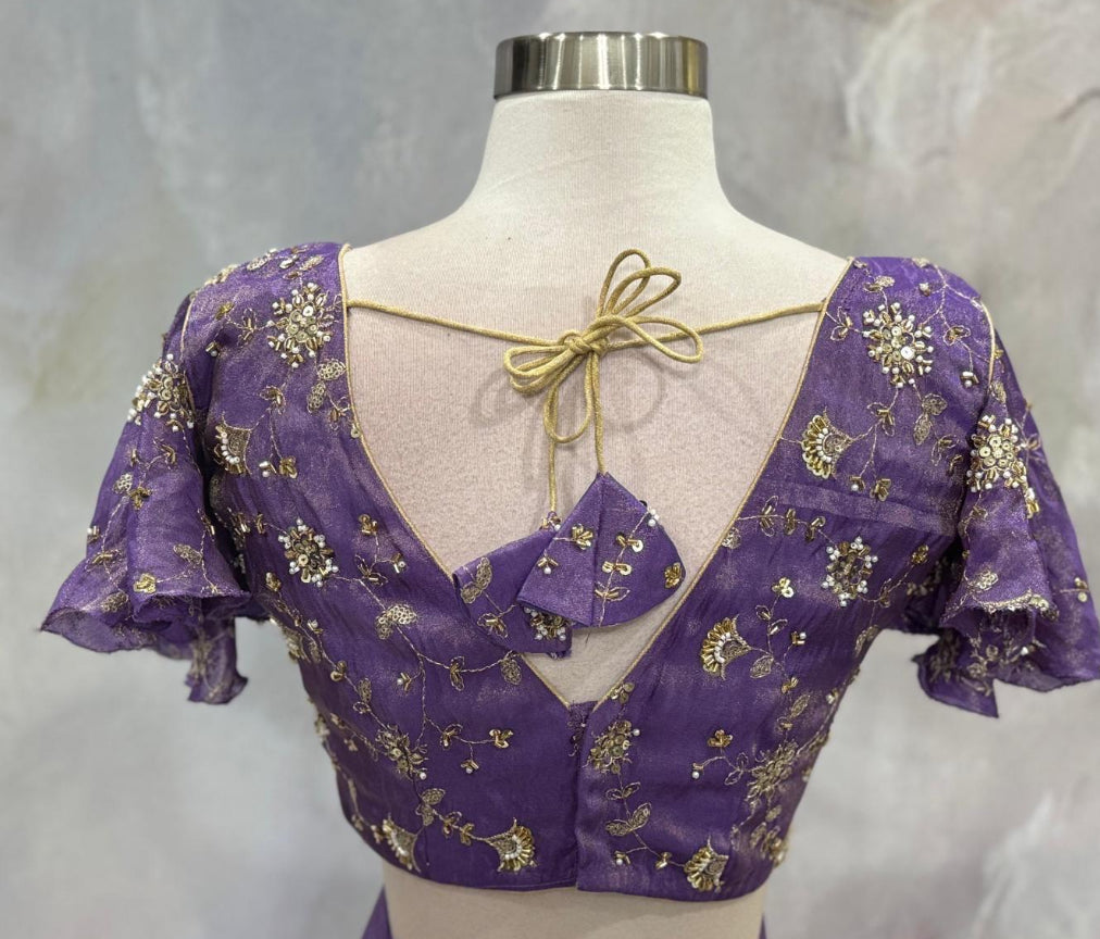 Custom elegance by Siyaras Fashion House. Size 36-38. This customized tissue crop top lehenga set from Siyaras Fashion House features a rich