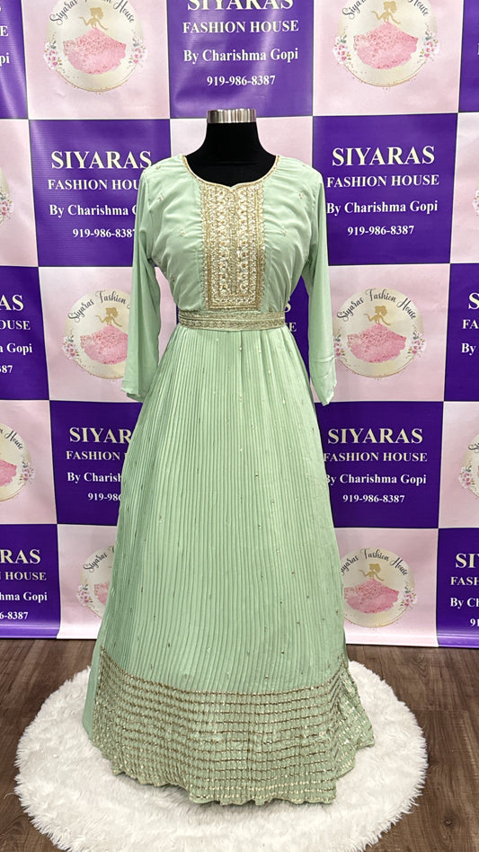 Beautiful pastel green long gown perfect for party wear. Fits size 36.
Gown length is 53.