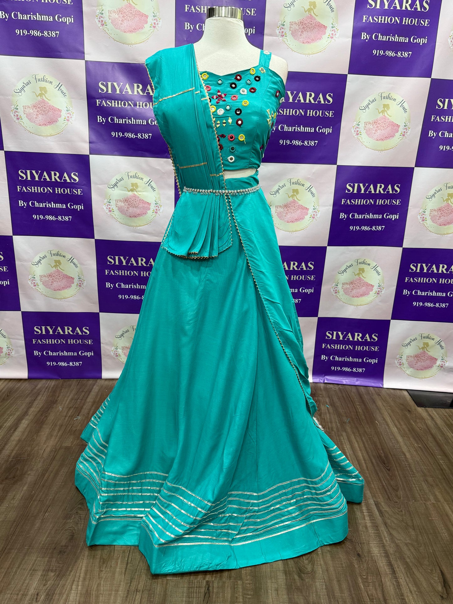 Navratri Chaniya choli with mirror work blouse in teal blue color size 40