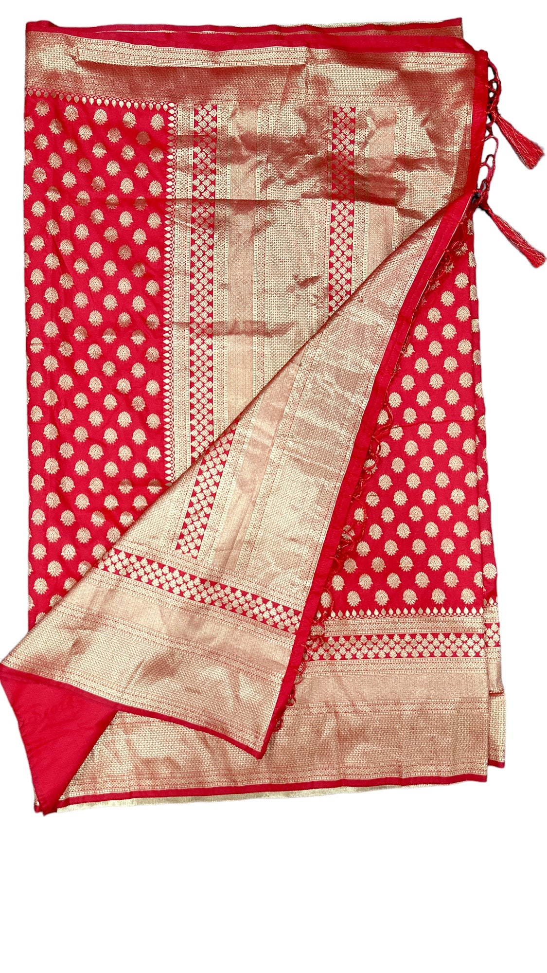 Fiery Red silk saree with elaborate zari work and comes with stitched Designer Blouse
