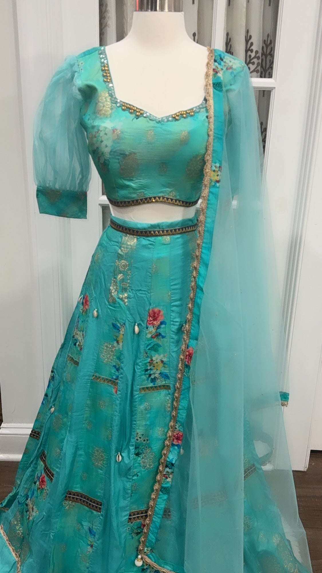 Trendy Turquoise color silk Lehenga Choli for teens with organza puff sleeve size 36
