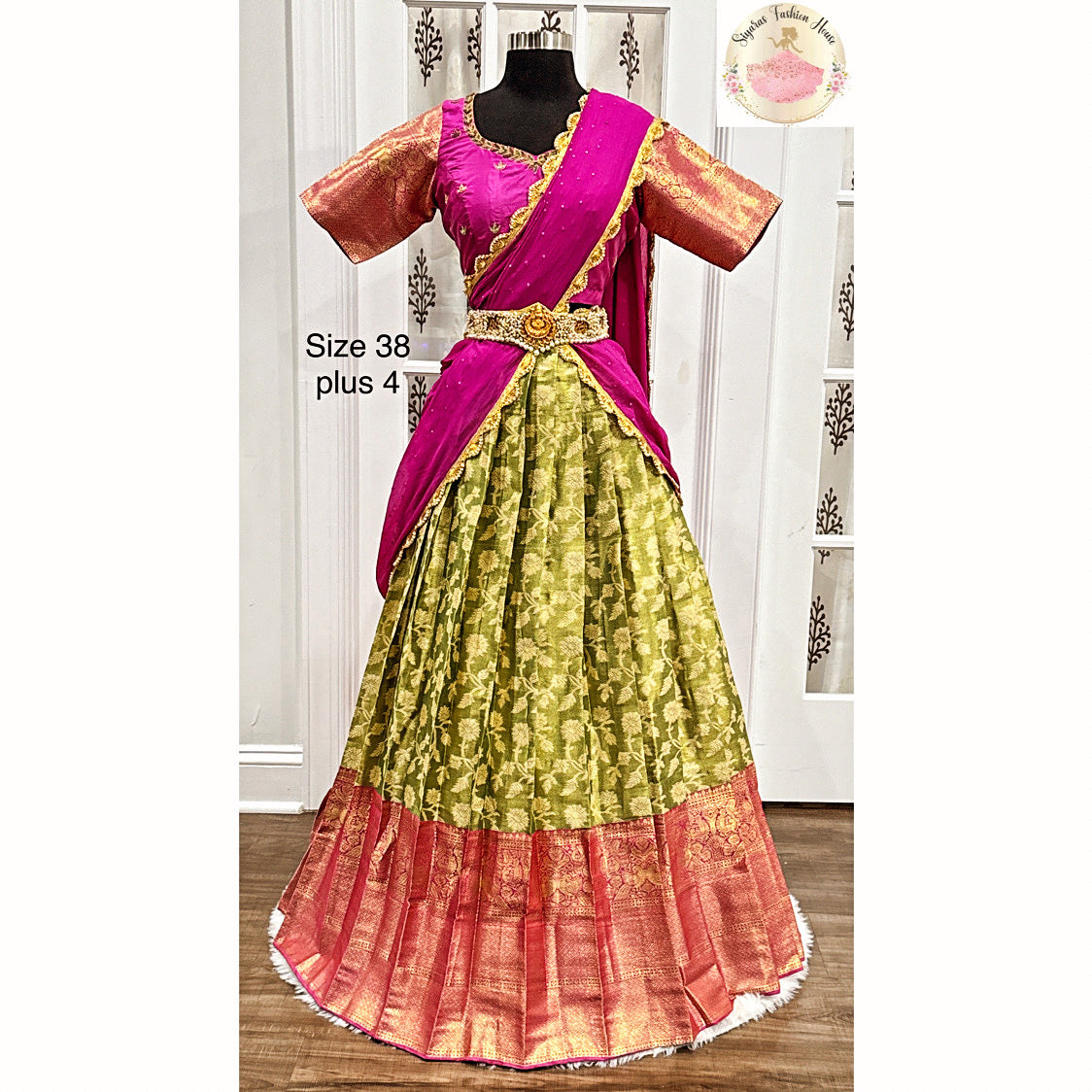 Beautiful half saree with Green banarasi skirt and pink silk blouse with Maggam work.