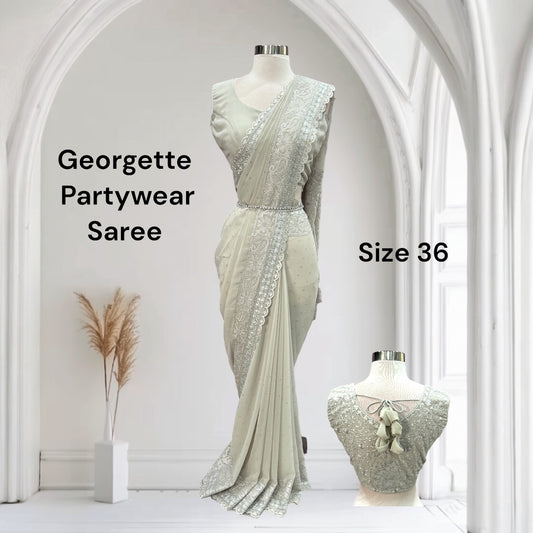 Gorgeous Partywear Georgette Saree with Stitched blouse size 36 thread work and stone work