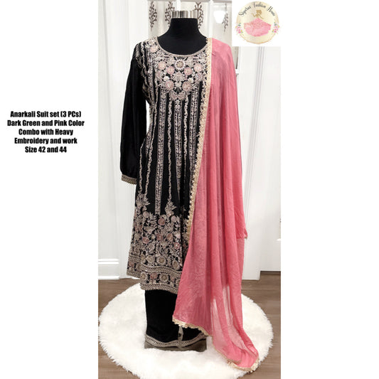 Pakistani Anarkali Suit Set in a striking combination of dark green and pink with heavy embroidery work