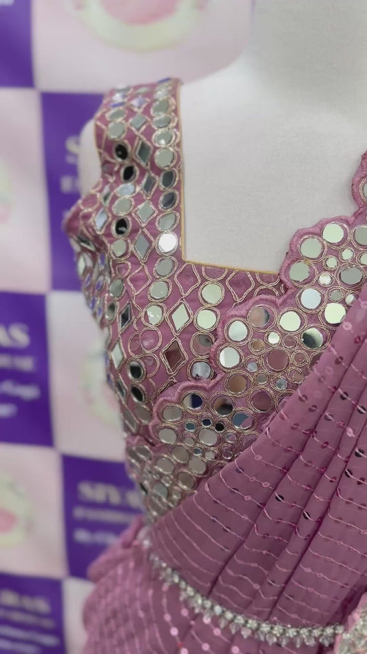 Beautiful sequence party wear saree with real mirror work border in Georgette fabric. Size available is 36/38 upto 42