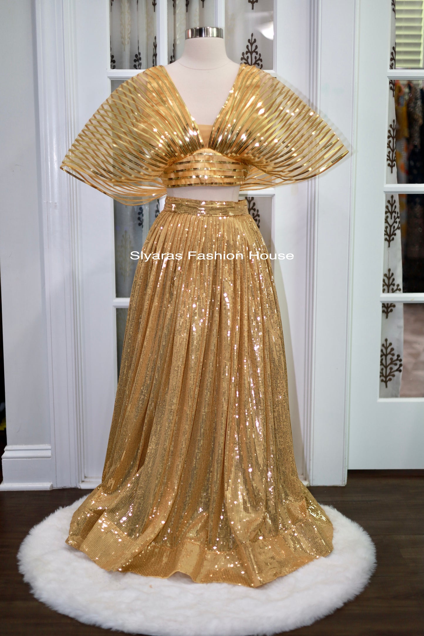 Super chic and trendy Metallic Ballon type Blouse with matching Gold Sequin Skirt
