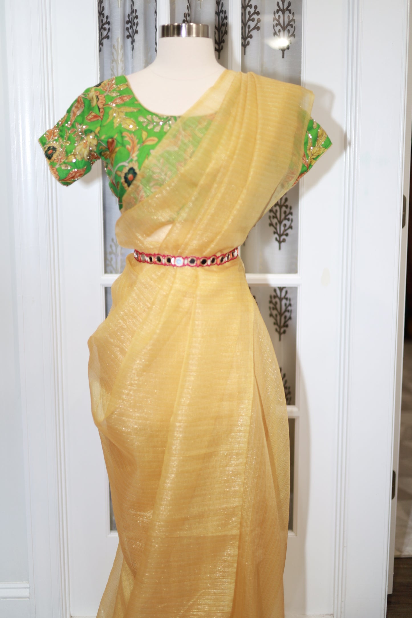 Organza saree with Kalamkari print  hand work stitched blouse
