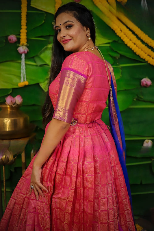 Traditional Pink Gown Pure Silk Fabric Accompanied With Crepe Lining And Zari border with Royal Pink Muggam worked Belt