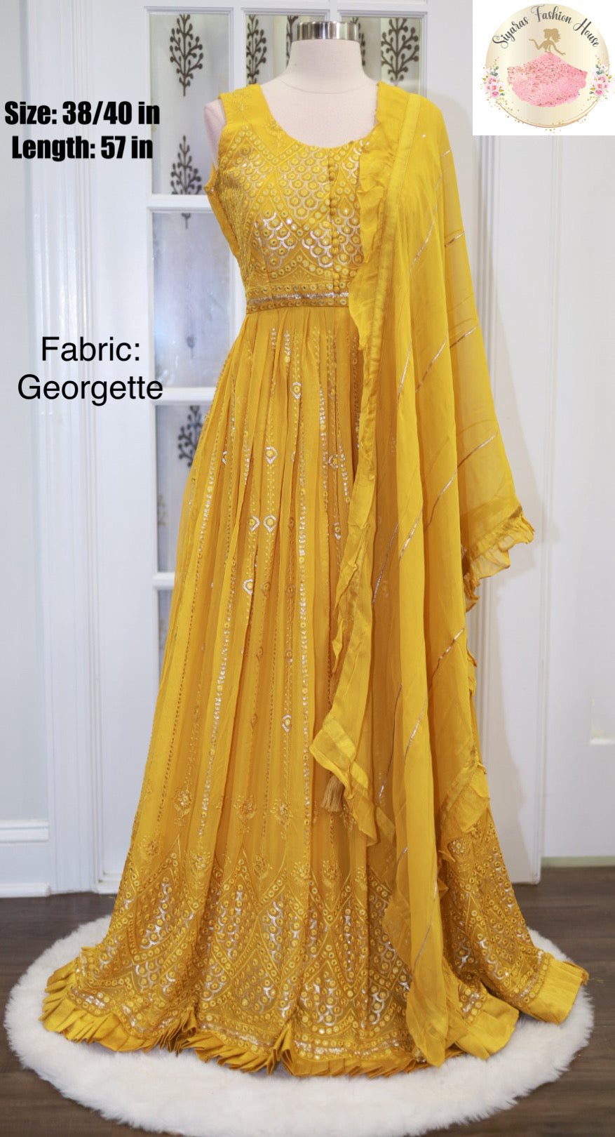 Gorgeous PartyWear Long gown in pure Georgette material with heavy Embroidery and sequin work. comes with matching Ruffle Dupatta