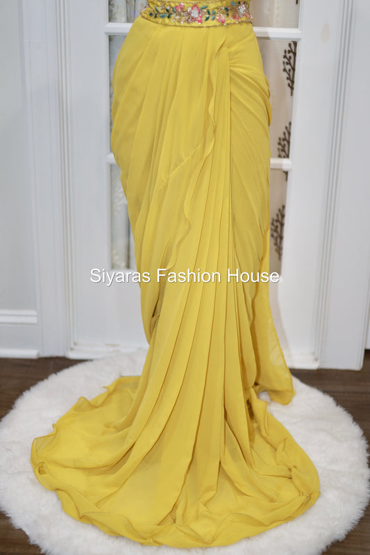 Chic and Trendy Elegant Ruffle saree Reqdy to wear in yellow color for Partywear/wedding function.